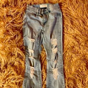 Light denim distressed jeans
